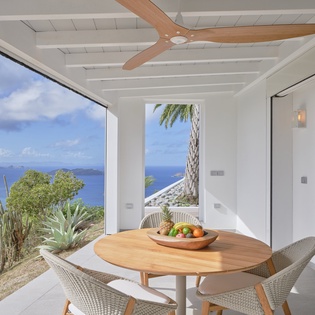 Your private terrace offers stunning ocean views while you dine al fresco, with gentle sea breezes and tropical surroundings creating the perfect retreat.
