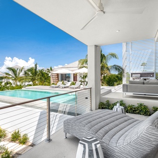 Unwind on your private terrace with stunning ocean views, plush loungers, and your own infinity pool just steps away.