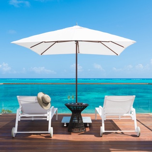 Soak up the sun on your private deck with stunning ocean views, poolside loungers, and refreshing drinks perfectly positioned for ultimate relaxation.