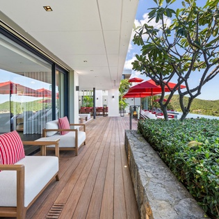 Your private oasis awaits on this stunning terrace, where comfortable seating and mountain views create the perfect escape for morning coffee or evening relaxation.