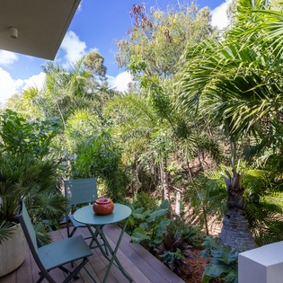 Step onto your private balcony and immerse yourself in lush tropical gardens, where morning coffee tastes even better.