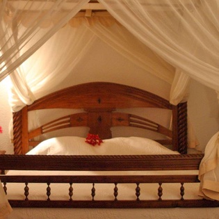 Bedroom at WV JCC, Pointe Milou, St. Barthelemy