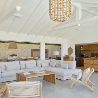 Unwind in this airy open-plan living space where natural textures and clean lines create your perfect retreat sanctuary.