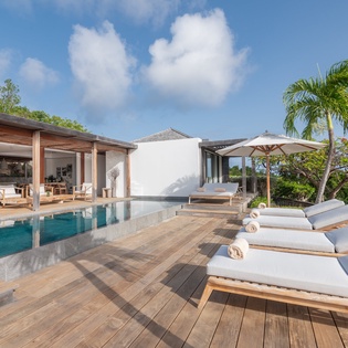 Sun-soaked elegance meets tropical tranquility with your private pool, stylish loungers, and breezy open-air pavilion—all framed by lush gardens and serene ocean vistas.