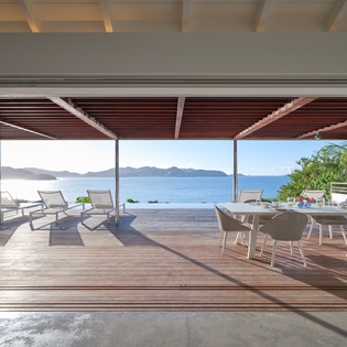 Step onto your private terrace where ocean breezes meet modern comfort, perfect for morning coffee or sunset dinners with stunning sea views.