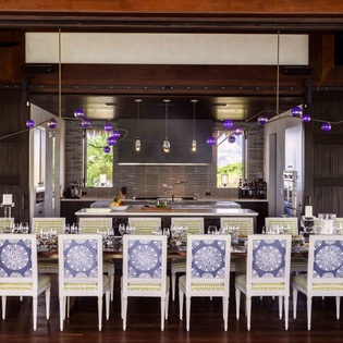 Gather around this stunning dining space where modern elegance meets comfort, perfect for memorable meals with your group.