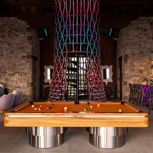 Challenge friends to a game at your premium pool table while enjoying cocktails at the stylish bar.