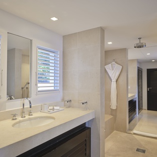 Luxurious bathroom with sleek marble finishes, walk-in shower, and premium amenities for your ultimate relaxation.