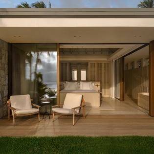 Unwind on your private terrace where modern comfort meets tropical elegance, seamlessly blending indoor luxury with outdoor serenity.