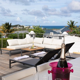 Picture yourself relaxing on your private terrace, champagne chilled and ocean breezes surrounding you—an idyllic retreat awaits.