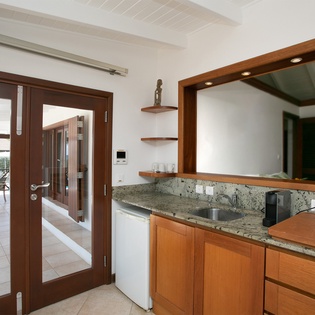 Step into your private sanctuary where warm wood tones and polished granite invite you to refresh and unwind in effortless style.
