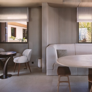 Settle into your sophisticated living space where sleek modern design meets comfort—perfect for planning your next adventure or simply unwinding.