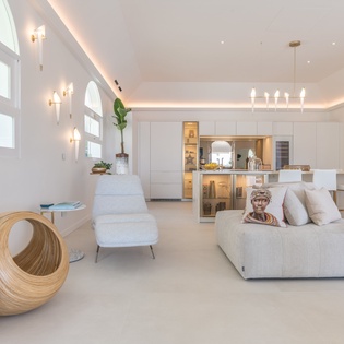 Step into your bright, modern sanctuary where minimalist design meets warm comfort—perfect for relaxing after exploring.