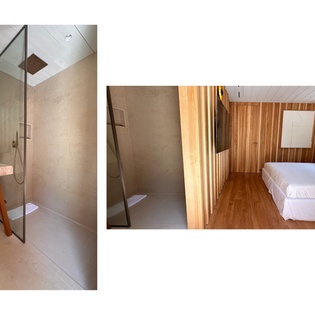 Step into your modern ensuite where sleek glass and warm wood create the perfect retreat after exploring.