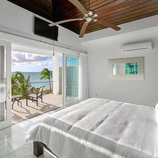 Bedroom at TC AMA, Sapodilla Bay, Turks & Caicos