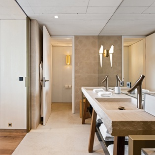Step into your luxurious spa-like bathroom with dual sinks, plush robes, and elegant finishes that make your daily routine feel like a five-star retreat.