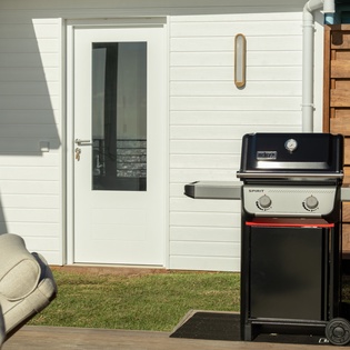 Fire up your favorite meals on this sleek outdoor grill, perfectly positioned for memorable backyard barbecues during your stay.