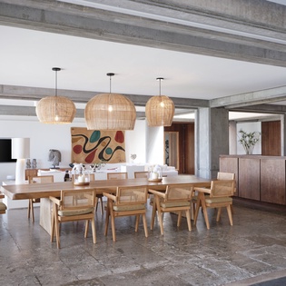 Your open-plan dining space flows seamlessly with warm pendant lighting and natural textures creating the perfect atmosphere for memorable meals.