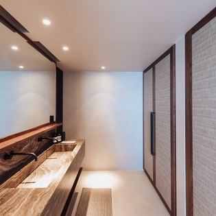 Step into your luxurious bathroom sanctuary, where natural wood meets modern elegance in perfect harmony.