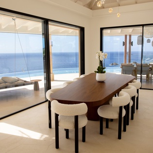 Your dining space opens to breathtaking ocean views, where meals become unforgettable moments framed by endless blue horizons.