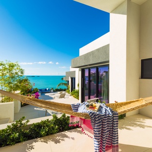 Picture yourself unwinding in your private hammock, drifting off to the gentle sound of the waves as the turquoise sea stretches endlessly before you—pure paradise awaits.