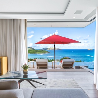 Your living room opens to paradise with seamless indoor-outdoor flow, where ocean breezes and stunning sea views create your perfect retreat.