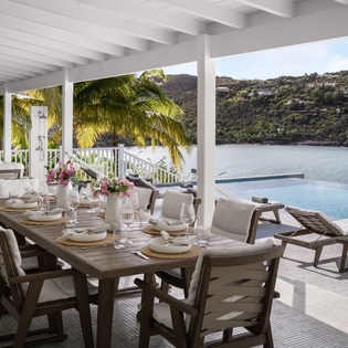 Dine al fresco while soaking up stunning water views from your private terrace with infinity pool.