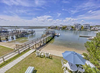 Waterfront paradise with private dock access and peaceful bay views for your coastal getaway.