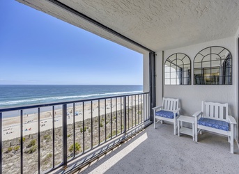 Relax on your private balcony with stunning ocean views, where gentle sea breezes and endless blue horizons create your perfect seaside escape.
