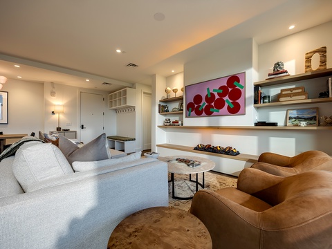 Sink into plush seating and let your worries melt away in this beautifully designed living space, where modern elegance meets cozy comfort—your perfect retreat awaits.