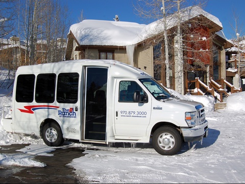 A complimentary shuttle awaits to whisk you from the snow-dusted property to nearby slopes and town, ensuring effortless winter adventures.