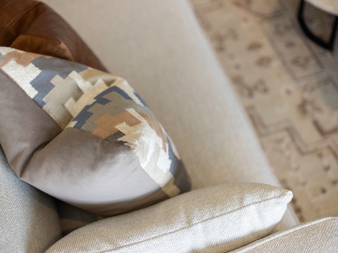 Sink into soft cushions with thoughtful patterns that make your living space feel warm and inviting from the moment you arrive.