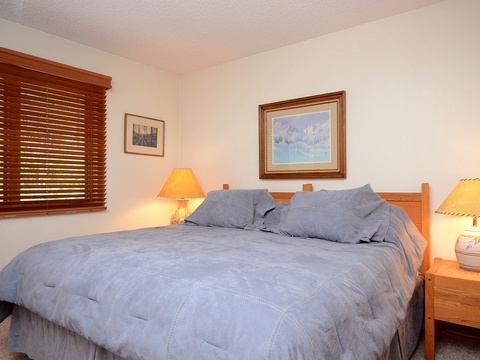 Relax in your cozy bedroom with soft linens, warm bedside lighting, and peaceful artwork that invites restful nights. This comfortable sleeping space feels like home from the moment you arrive.