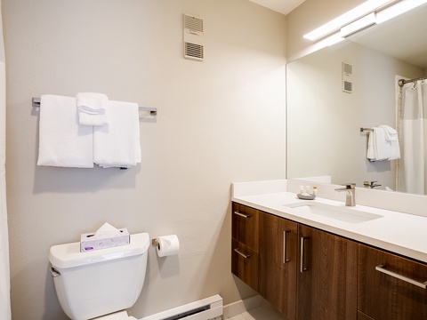 Refresh in your private bathroom with modern fixtures, soft towels, and a bright, welcoming design that makes every morning feel effortless.