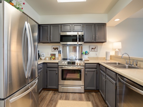 Your fully equipped kitchen features stainless steel appliances, granite countertops, and stylish cabinetry—everything you need to prepare meals just the way you like them.