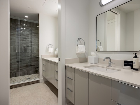 Step into your spa-like ensuite, where sleek modern lines meet total relaxation. Refresh under your spacious walk-in shower or unwind at the double vanity—designed with you in mind.