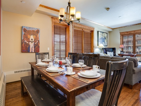 Gather around this spacious dining table with seating for eight, where meals become moments and your group can reconnect over coffee or wine in the warm, mountain-modern atmosphere.