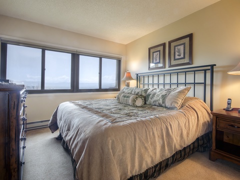 Sink into the plush king bed dressed in soft linens after a long day exploring. Warm bedside lamps and tasteful artwork create a soothing retreat.