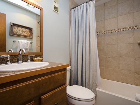 Refresh in your well-appointed bathroom with a soaking tub, stylish tilework, and granite vanity—everything you need to unwind after a day of adventure.
