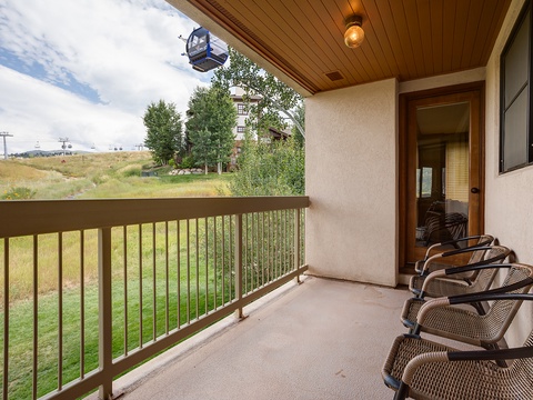 Step onto your private balcony, where peaceful mountain views and fresh alpine air await. Perfect for morning coffee or unwinding after a day exploring nearby ski slopes.