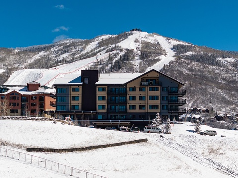 Nestled at the base of pristine ski slopes, your mountain retreat offers direct access to powdery runs and breathtaking alpine views.