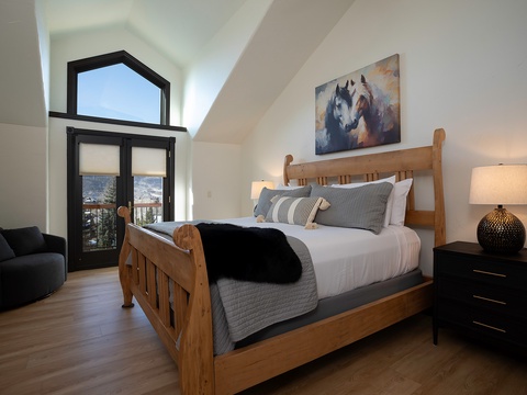 Sink into your plush bed beneath vaulted ceilings and let the mountain views outside your window set the scene for a perfect night's rest.