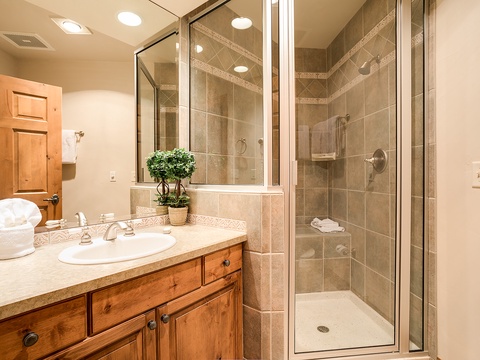 Step into your private spa-like retreat. The walk-in shower offers a refreshing escape, while plush towels and ample counter space make your morning routine a breeze.