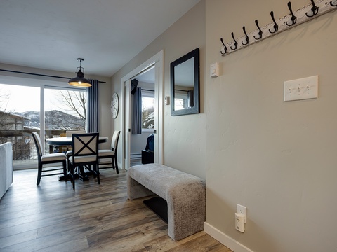Your cozy retreat welcomes you with warm wood floors, mountain views, and a thoughtfully designed space where comfort meets style—perfect for unwinding after a day of adventure.