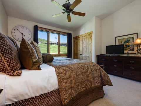Wake up to serene pasture views framed by your window, a plush bed dressed in elegant linens awaiting your restful nights in this peaceful retreat.