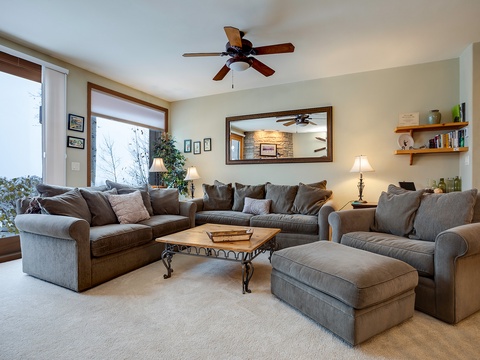 Sink into plush seating and feel right at home in this inviting living space, where natural light and thoughtful touches create your perfect retreat after a day of exploring.