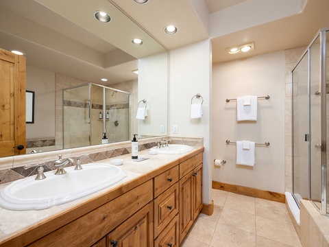 Step into your private spa-like retreat featuring dual vanities, a spacious walk-in shower, and elegant finishes that make every morning feel like a fresh start.
