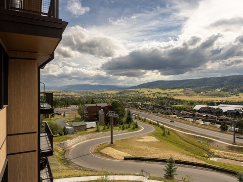 The property offers sweeping views of rolling hills, open valleys, and dramatic skies—a serene backdrop showcasing the natural beauty of the surrounding area.