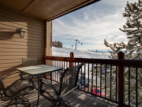 Step onto your private balcony and take in the stunning ski slope views. Sip morning coffee at your outdoor table while watching skiers glide down the mountain and gondolas sail overhead.