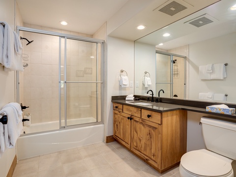 You'll love the double-vanity design and sleek finishes in your spacious bathroom. Unwind in the tub-shower combo or freshen up at the elegant counter with plentiful storage below.